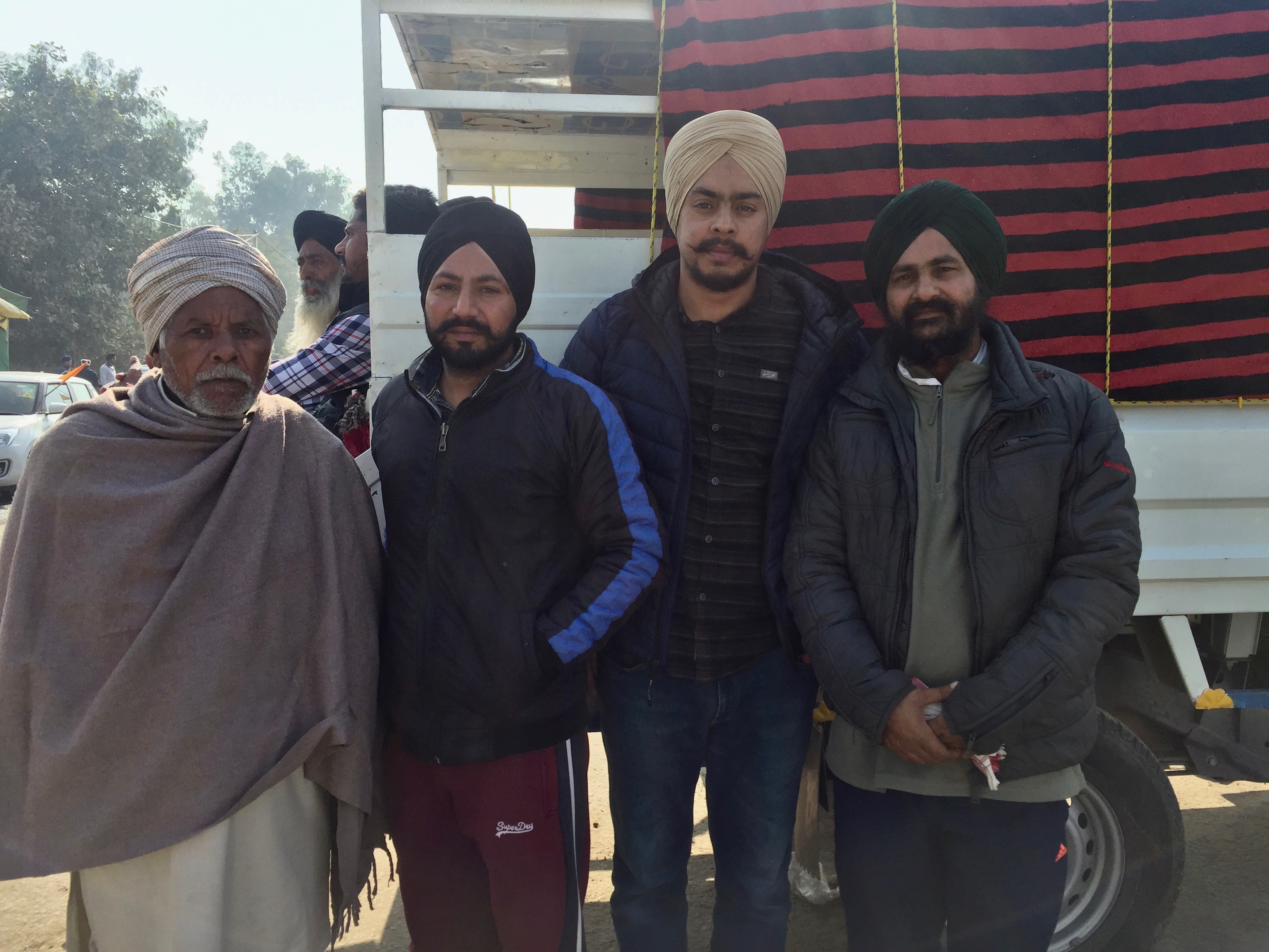 Satvant Singh (third from left) and Harsimran Singh (fourth from left) at Singhu before their departure. Photo: Vandana K Satvant Singh (third from left) and Harsimran Singh (fourth from left) at Singhu before their departure. Photo: Vandana K