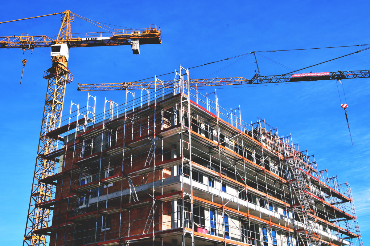 An apartment building that is under construction. (Public domain, from PXHere.)
