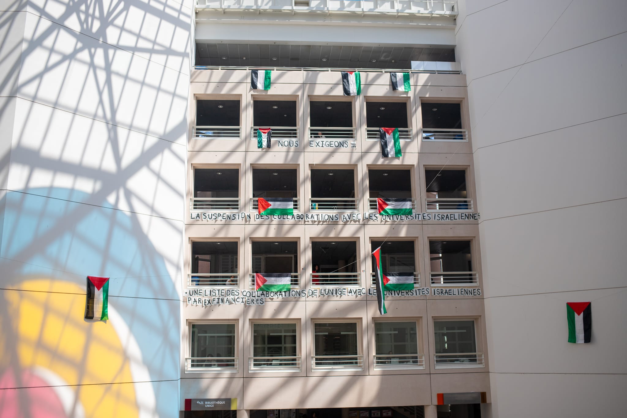 Photos at Bibliothèque de l'Université de Genève (Uni-Mail) taken by Yousra via Coordination étudiante pour la Palestine in Geneva.
