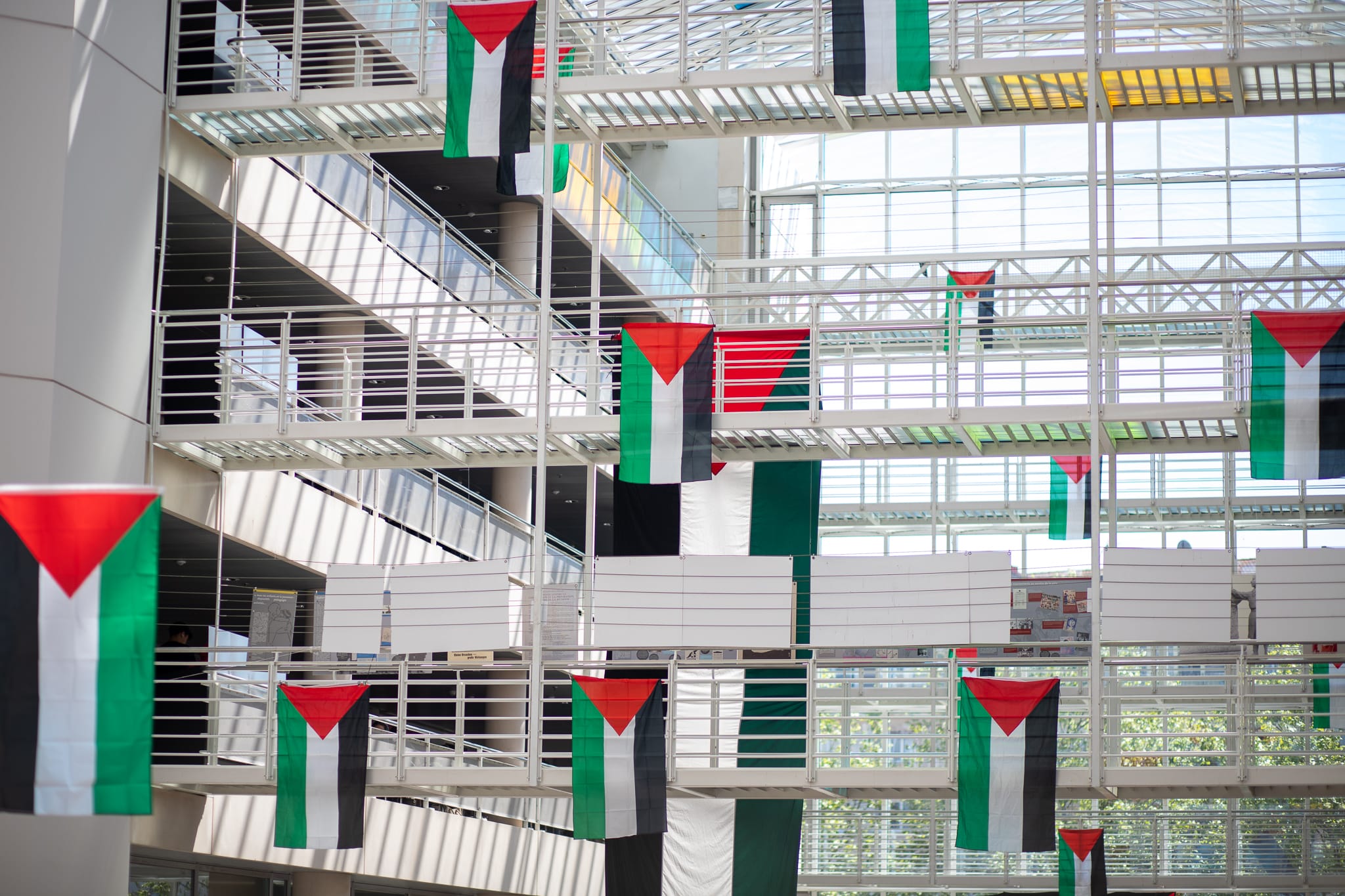 Photos at Bibliothèque de l'Université de Genève (Uni-Mail) taken by Yousra via Coordination étudiante pour la Palestine in Geneva.