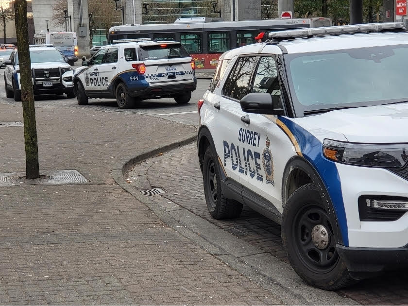 Surrey Police Service SUVs on Street.