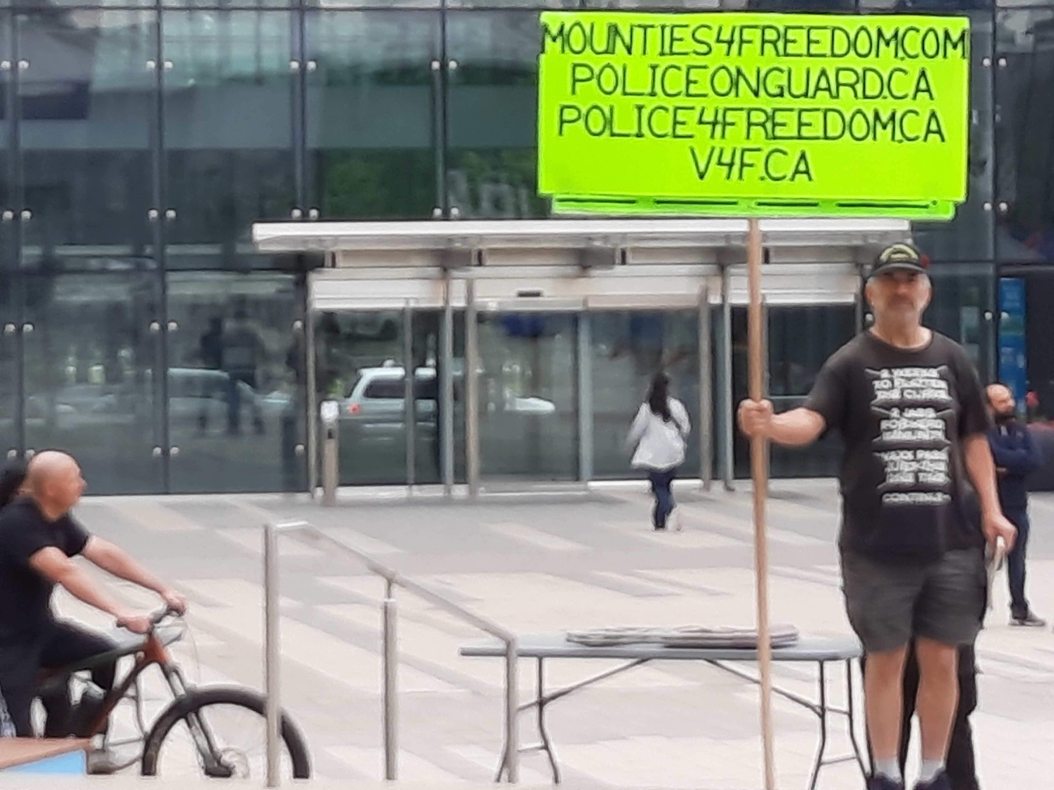 Far-right protester holds pro-police sign Far-right protester holds pro-police sign