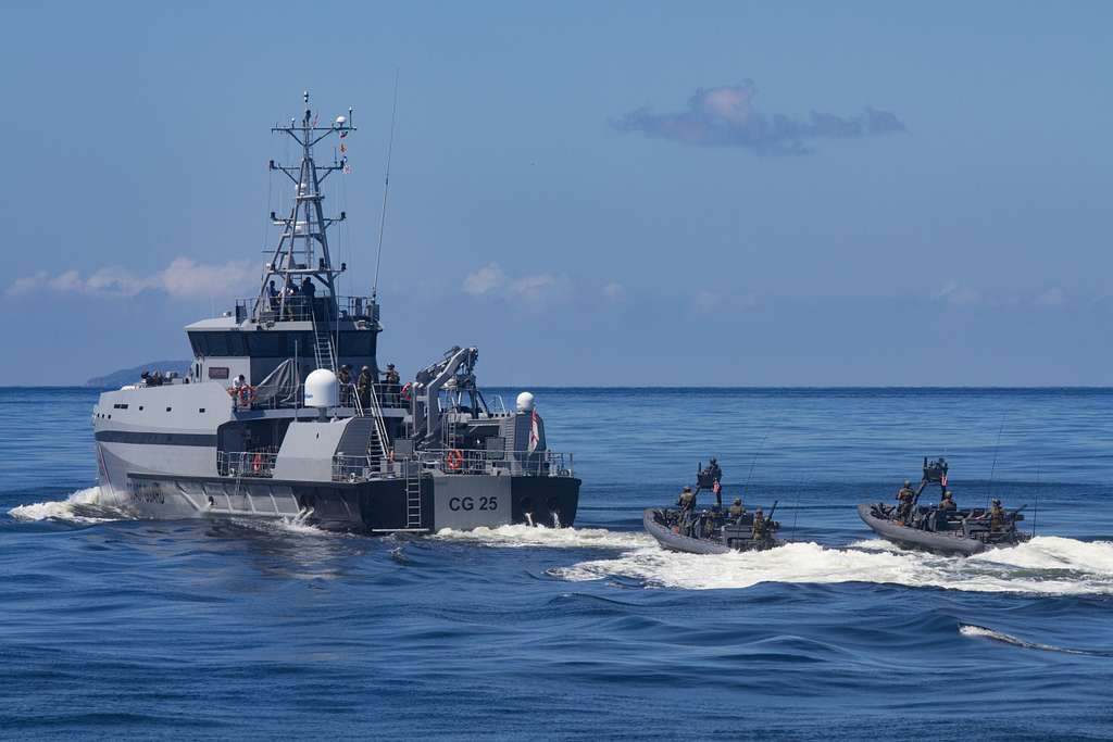 U.S. Naval Special Warfare and Trinidad and Tobago special navy units conduct maritime operations aboard a Trinidadian and Tobagonian coast guard vessel Sept. 27, 2016 during a culmination exercise in the Gulf of Paria, Trinidad and Tobago, as NSW Special Boat Teams provide security. (U.S. Army photo by Maj. Cesar Santiago)
