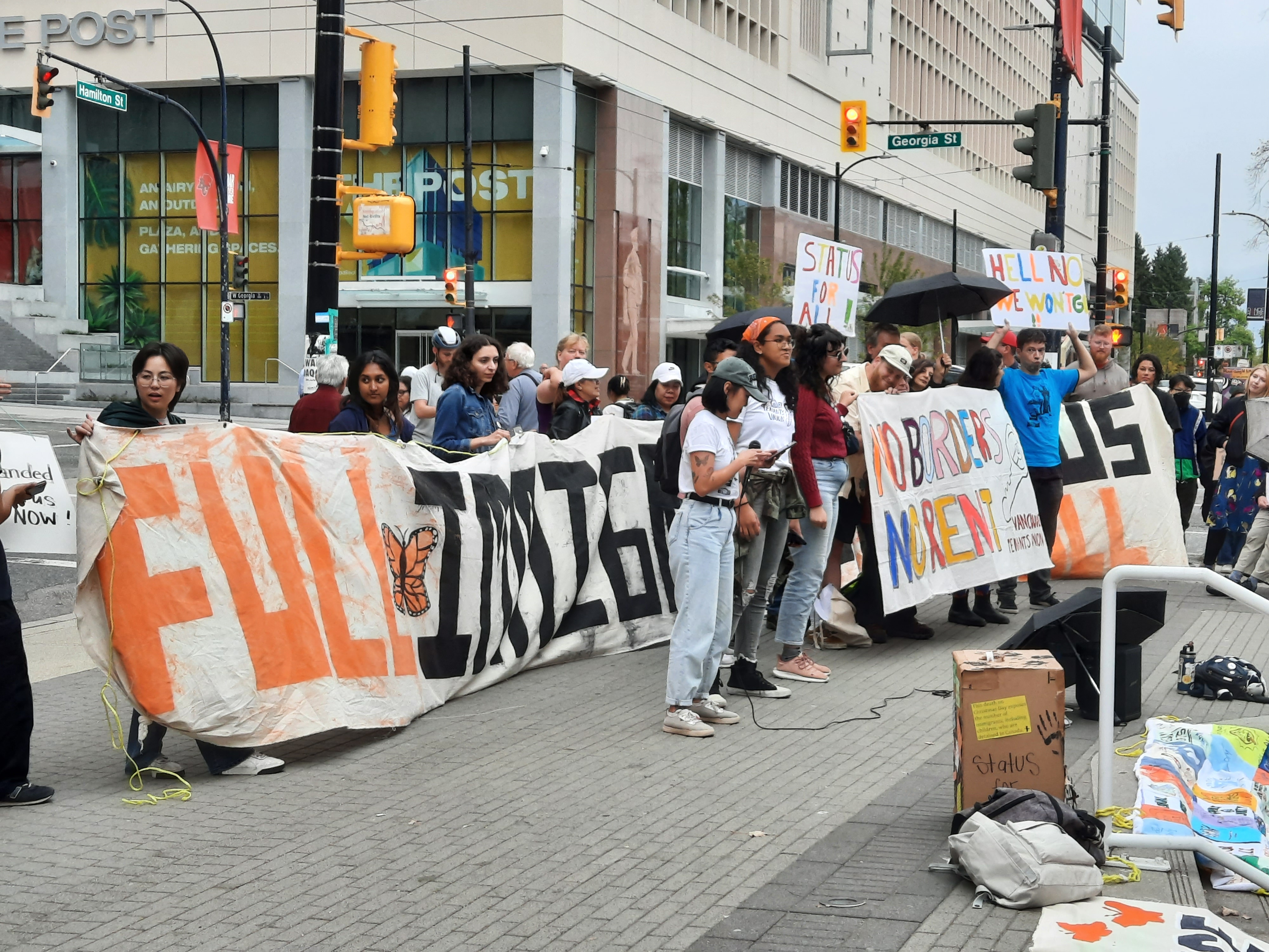 Vancouver rally with banners.