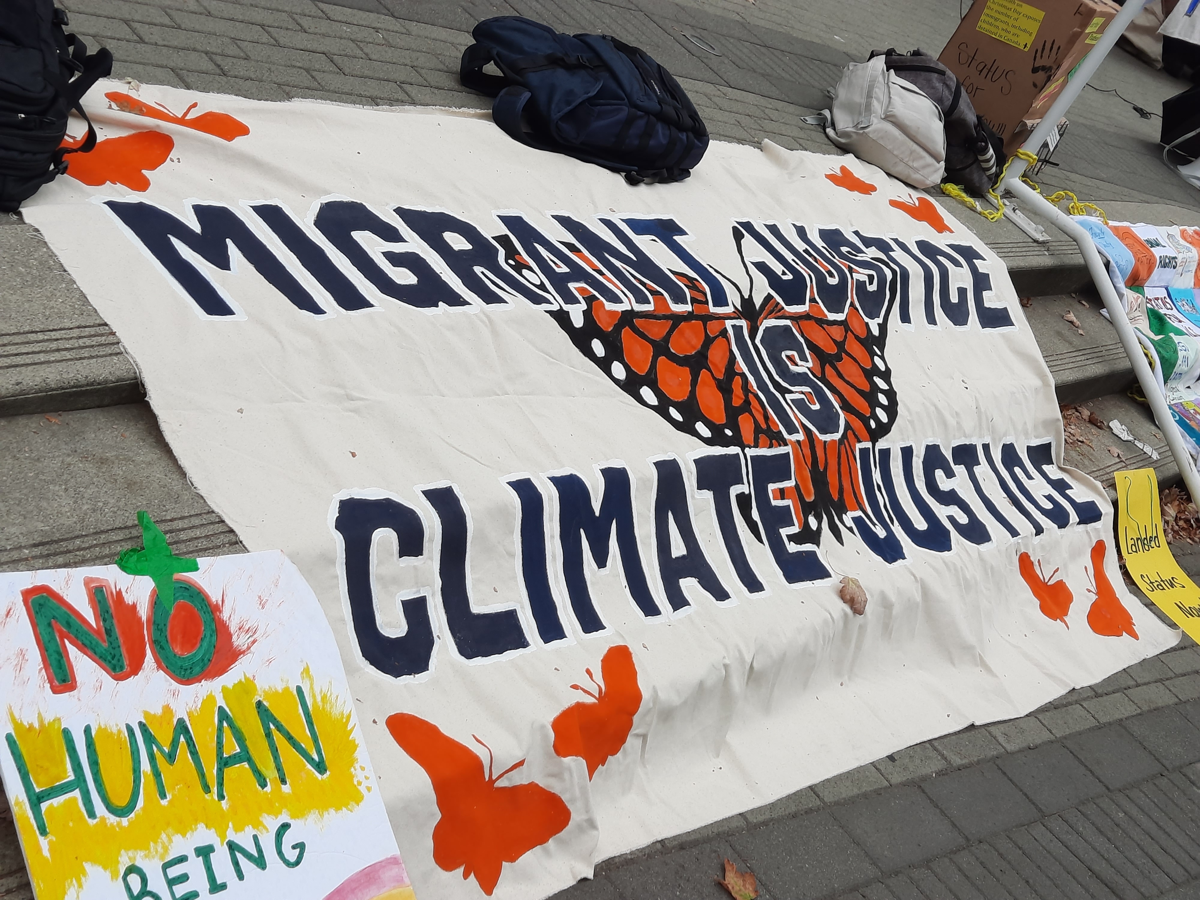 Vancouver rally with banners.