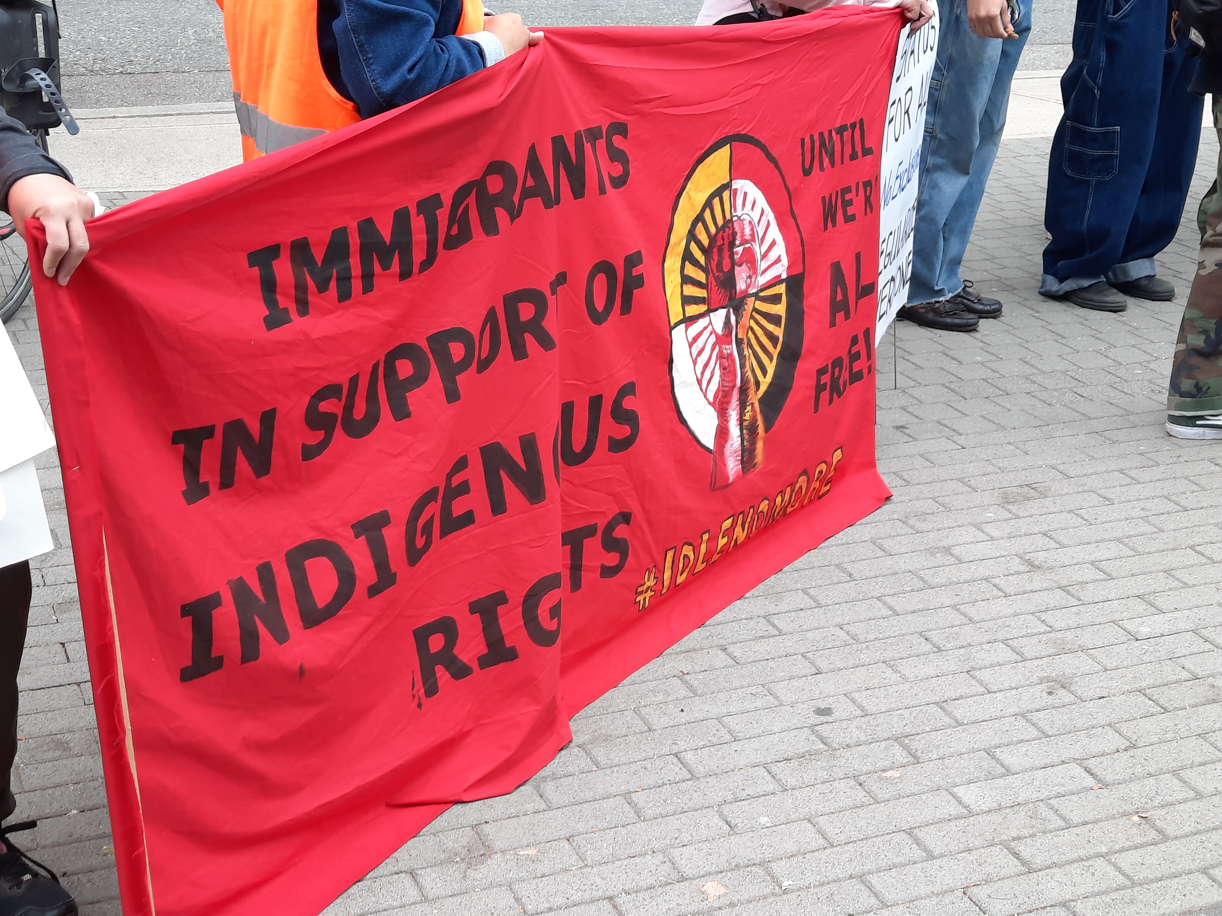 Vancouver rally with banners.