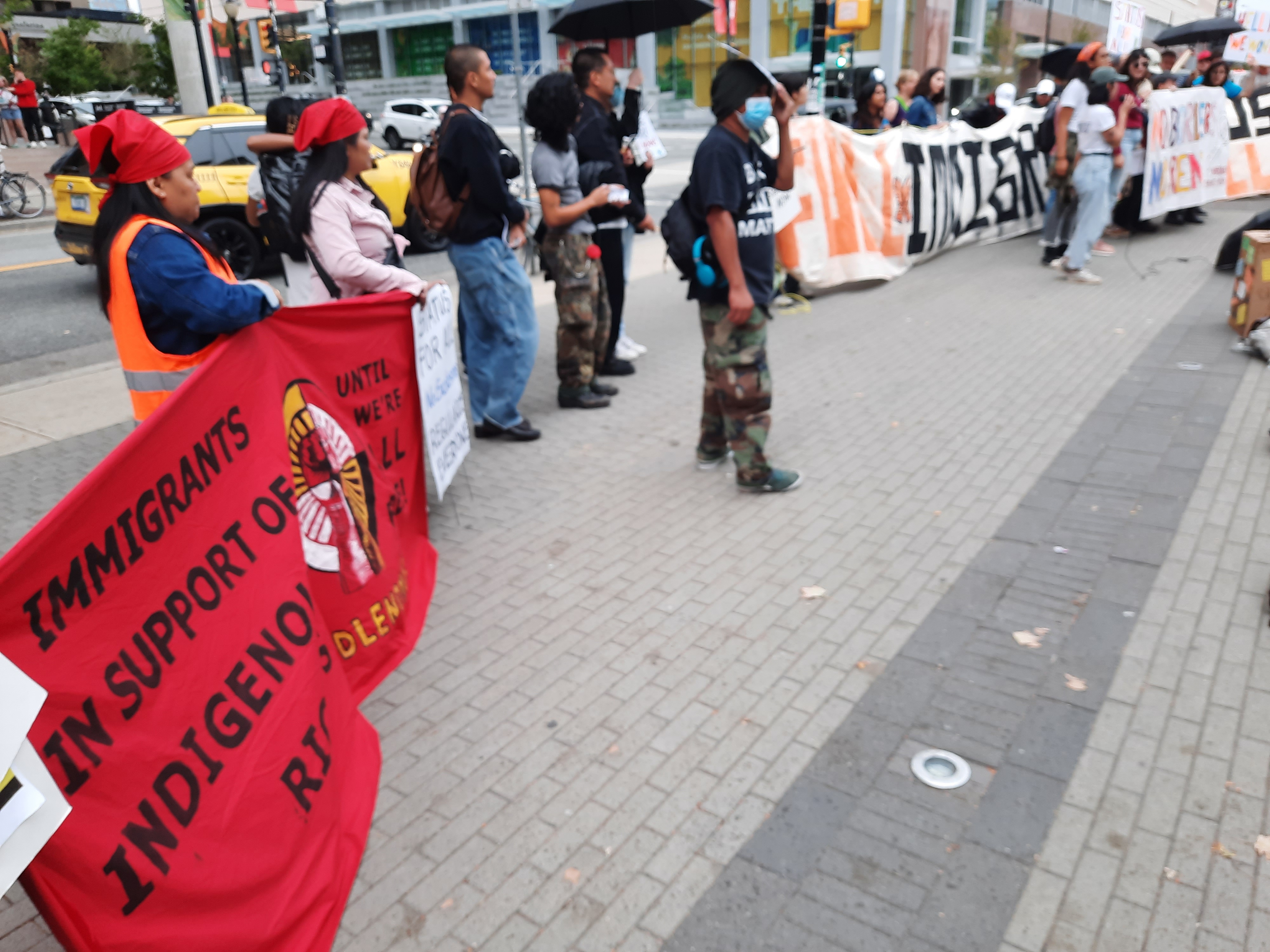 Vancouver rally with banners.