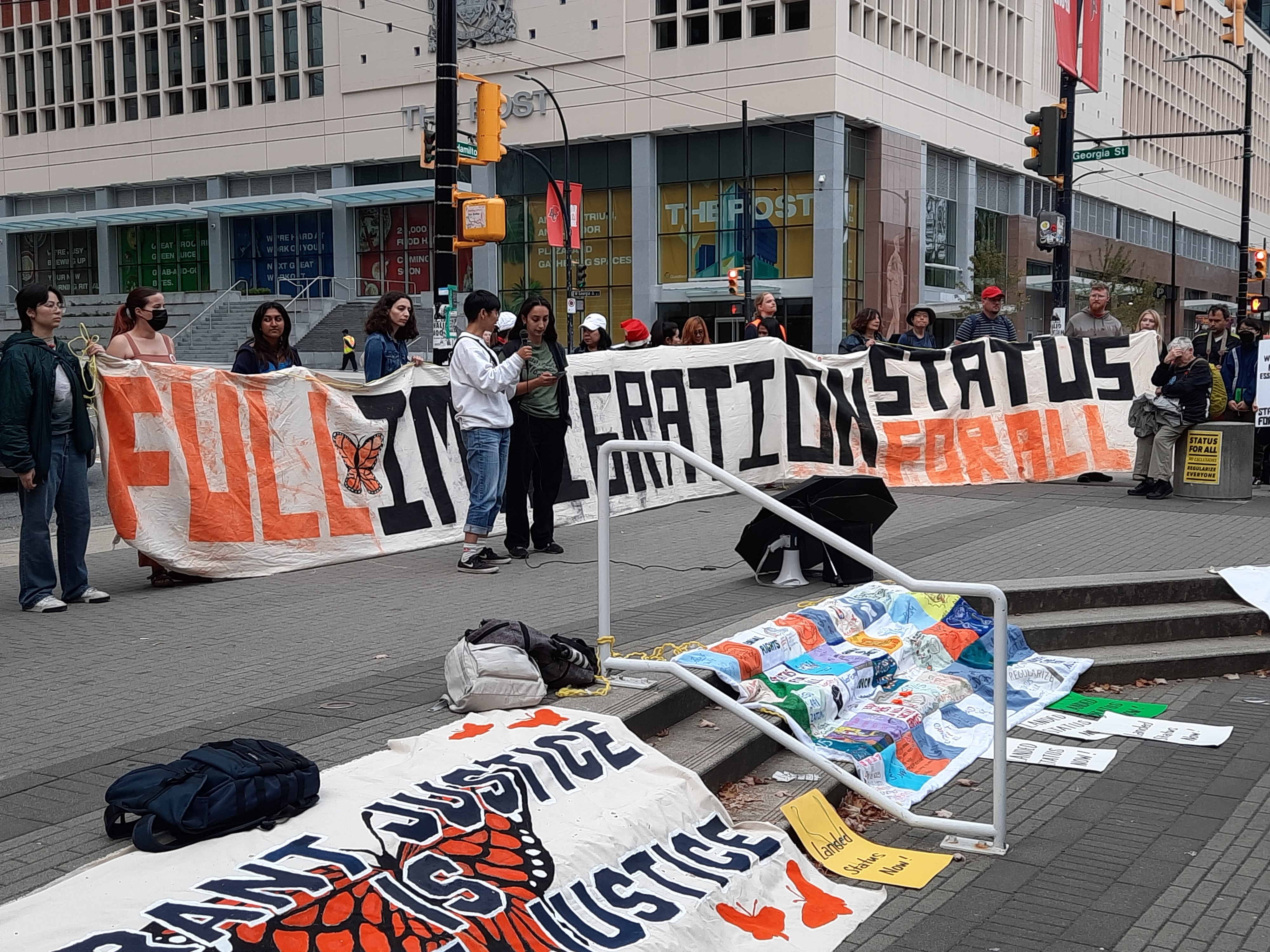 Vancouver rally with banners.