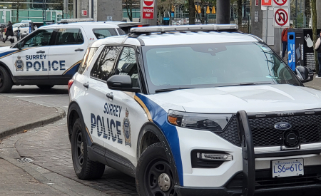 Surrey Police Service SUVs on Street.
