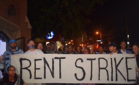 Tenants hold a banner outside the Weston King Neighbourhood Centre, where Toronto Mayor Olivia Chow met with them to discuss their ongoing rent strike. Photo by Fernando Arce. (either this or next pic?)
