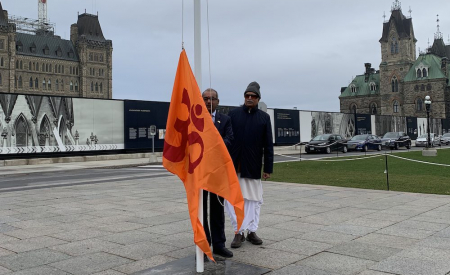 Saffron flag hoisting at Parliament Hill, Ottawa.