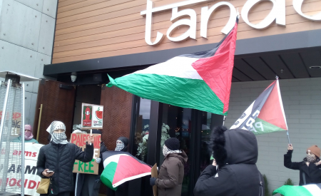 Protest outside restaurant.