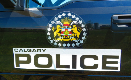 Calgary police Calgary police emblem on police vehicle.