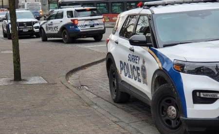 Surrey Police Service SUVs on Street.
