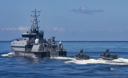 U.S. Naval Special Warfare and Trinidad and Tobago special navy units conduct maritime operations aboard a Trinidadian and Tobagonian coast guard vessel Sept. 27, 2016 during a culmination exercise in the Gulf of Paria, Trinidad and Tobago, as NSW Special Boat Teams provide security. (U.S. Army photo by Maj. Cesar Santiago)