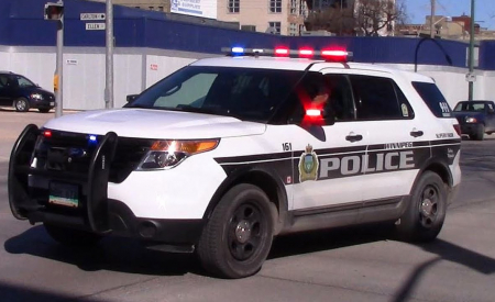 Winnipeg Police SUV with lights flashing.